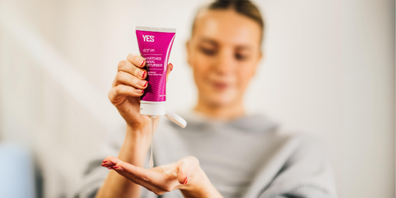 woman holding YES organic vaginal moisturiser