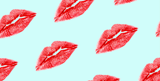 Red lip wallpaper on a turquoise background illustrating the #getlippy campaign