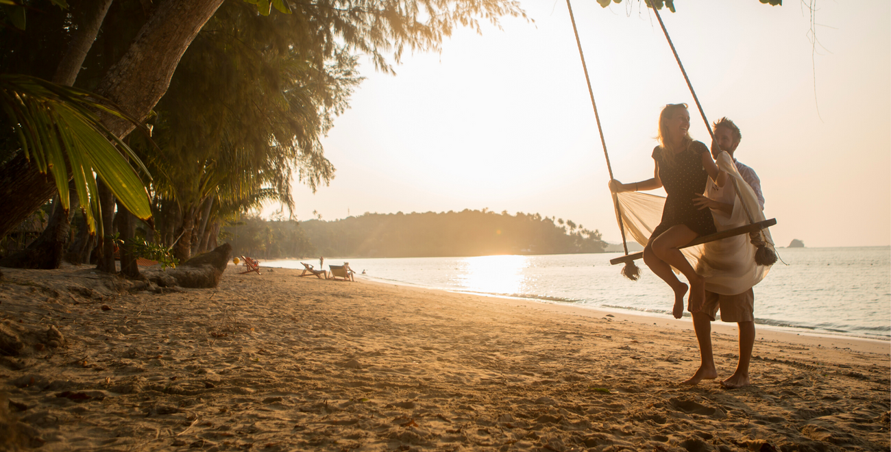 relaxed and smiling couple on holiday