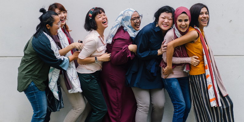 Group of smiling asian women
