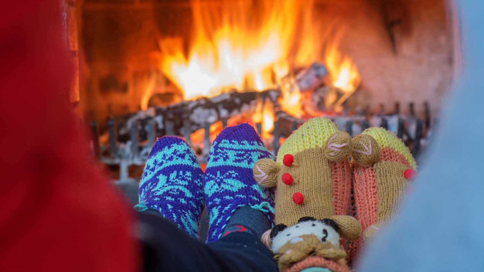 Christmas socks in front of a fire