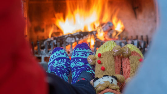 Christmas socks in front of a fire