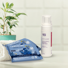 intimate care wipes and intimate foam wash displayed on a white table