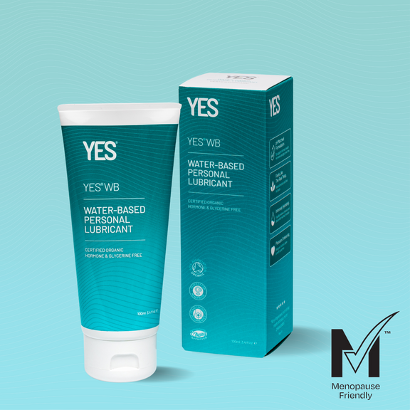 YES WB 100ml water based lubricant tube next to the WB water based lubricant carton on a light blue contoured background. The MTick menopause friendly logo is in the bottom right corner as the product is approved by the GenM MTick team and framework