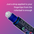 YES O YES bottle with the lid off.  You can see the rollerball at the top of the bottle which applies the oil to fingertips.  The text says 'Just a drop applied to your fingertips from the rollerball is enough